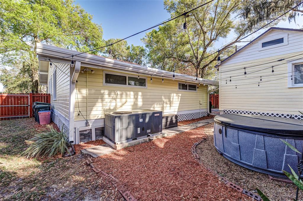 749 South Rushing Avenue Lakeland, FL 33801 - Photo 43 of 45 a view of a house with a yard and garage