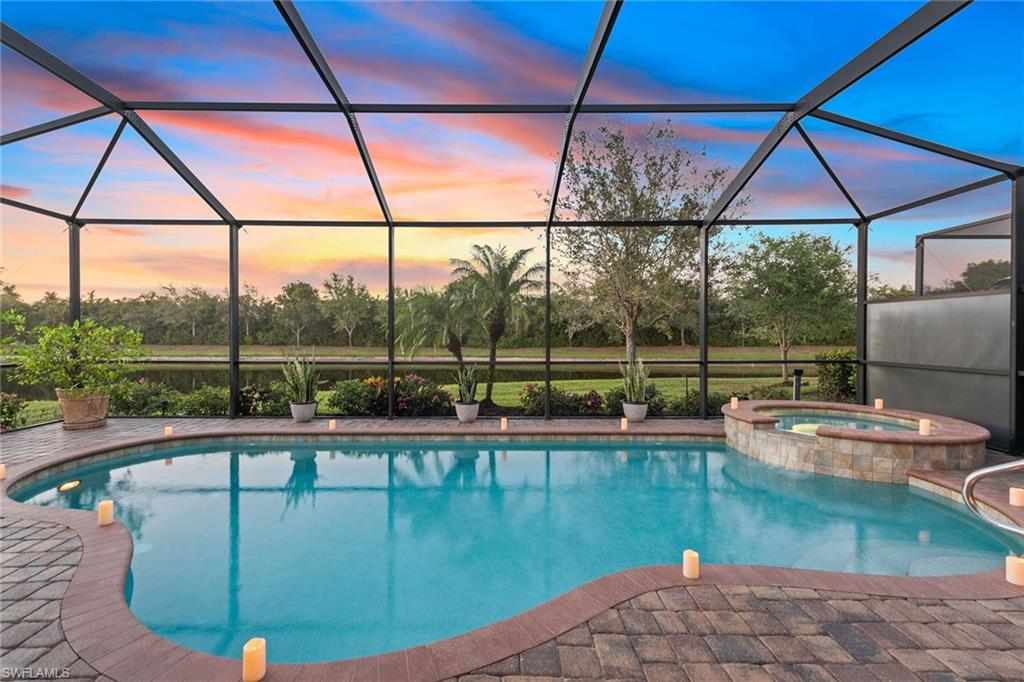 2806 Aviamar Circle Naples, FL 34114 - Photo 1 of 50 a view of a balcony with a swimming pool