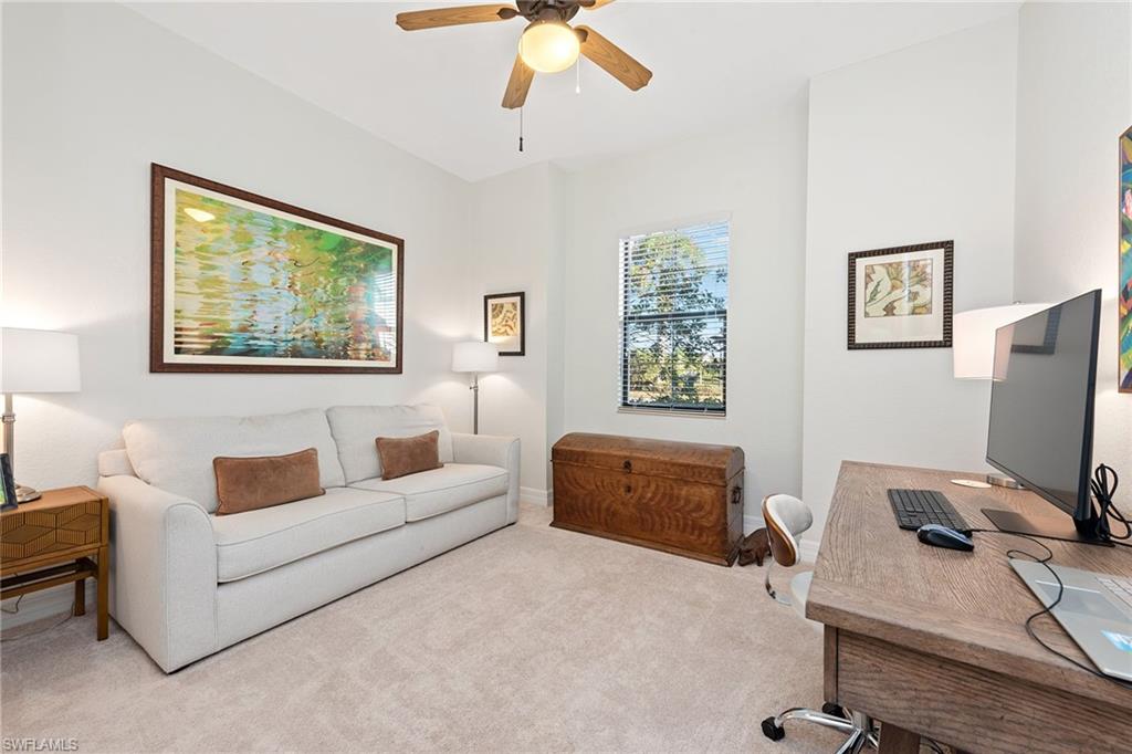 2806 Aviamar Circle Naples, FL 34114 - Photo 13 of 50 a living room with furniture and a window