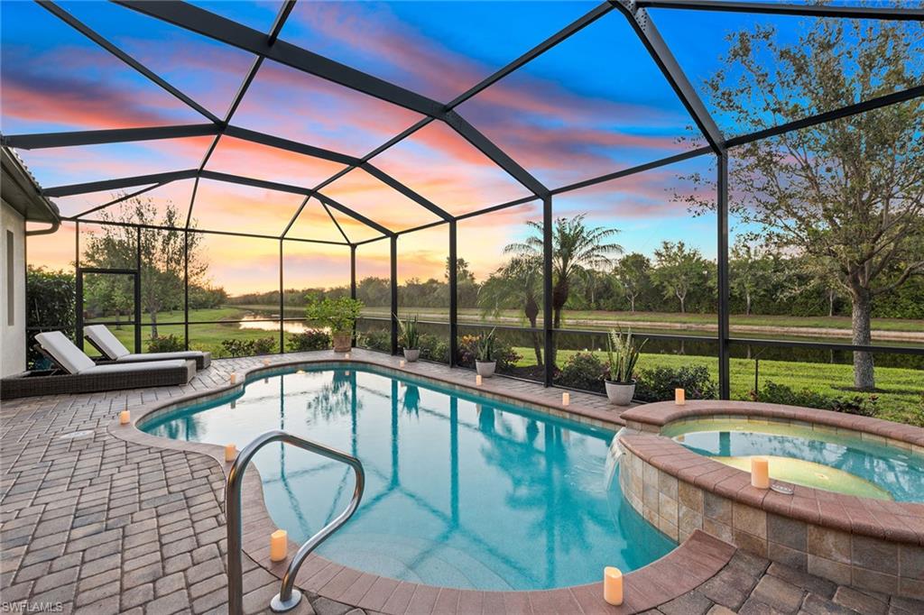 2806 Aviamar Circle Naples, FL 34114 - Photo 25 of 50 a view of a swimming pool with a porch