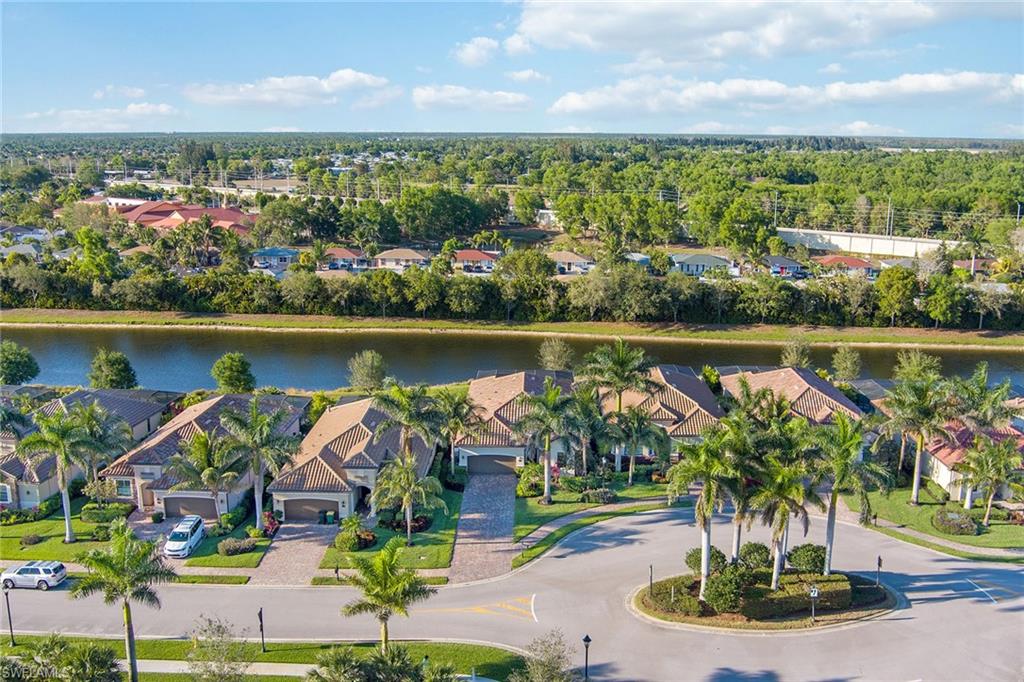 2806 Aviamar Circle Naples, FL 34114 - Photo 35 of 50 a view of a city with lake