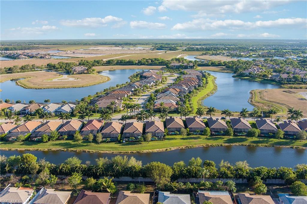 2806 Aviamar Circle Naples, FL 34114 - Photo 39 of 50 a view of a city with an ocean and houses