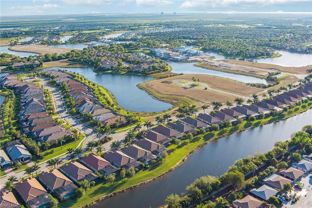 2806 Aviamar Circle Naples, FL 34114 - Photo 40 of 50 an aerial view of residential houses with outdoor space