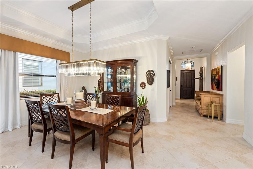 2806 Aviamar Circle Naples, FL 34114 - Photo 8 of 50 a view of a dining room with furniture window and outside view