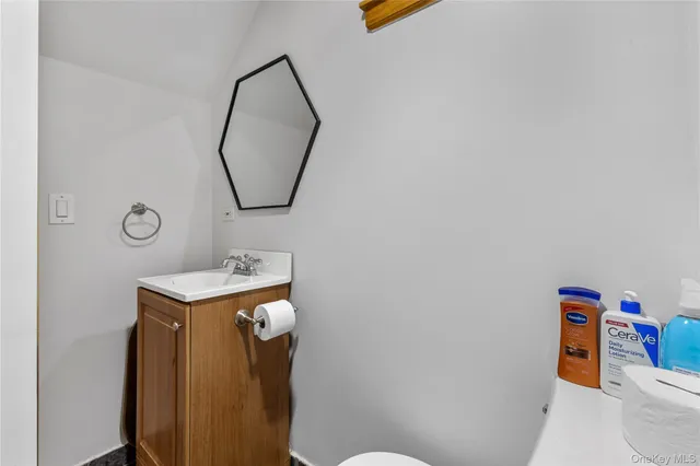 a bathroom with a toilet and a sink