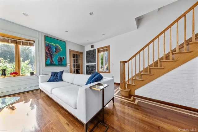 a living room with furniture and a table