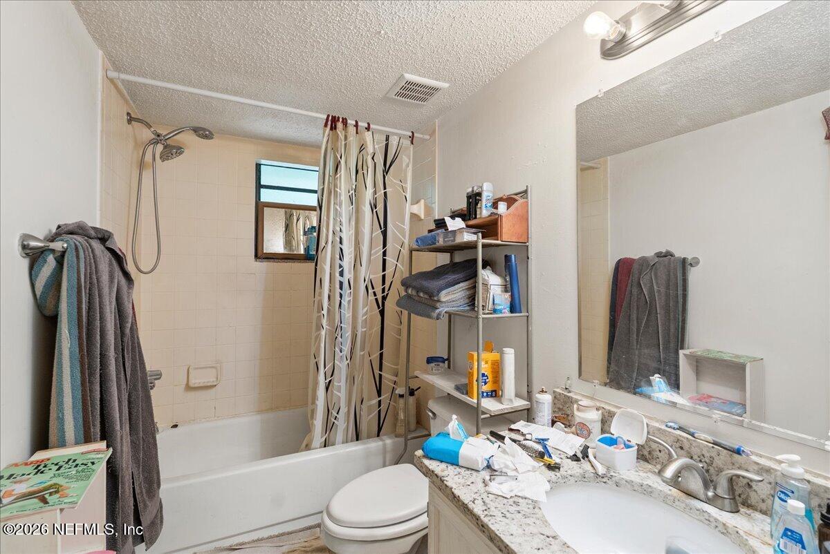 2910 Post Street Jacksonville, FL 32205 - Photo 11 of 34 a bathroom with a sink toilet and shower