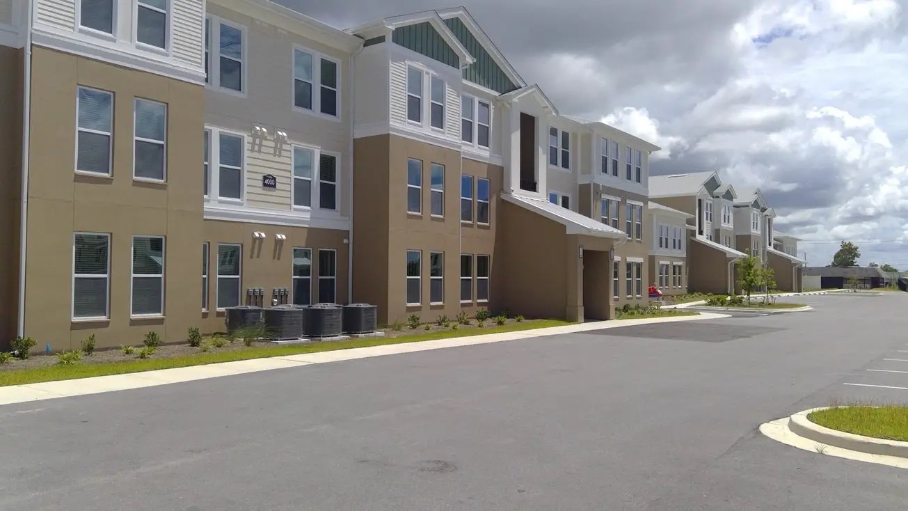 a view of a building with a street