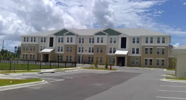a front view of a building with street view