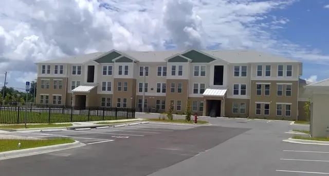a front view of a building with street view