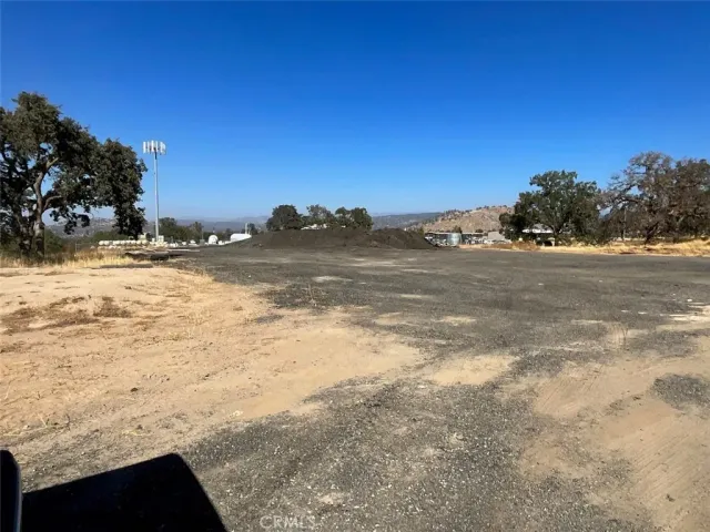 a view of a lake with a yard