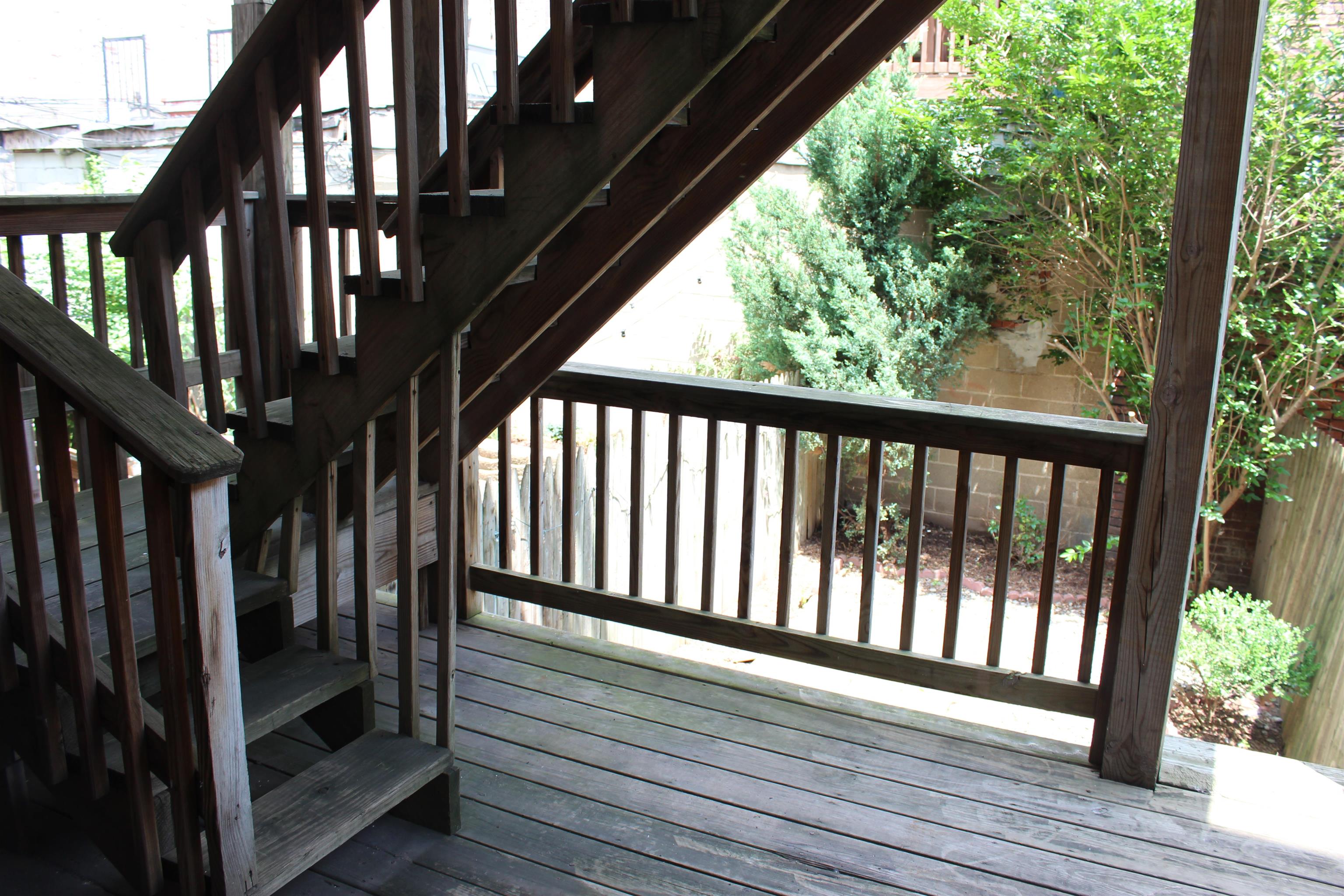 182 Christopher Columbus Drive, Unit 2 Jersey City, NJ 07302 - Photo 8 of 12 a view of staircase with lots of trees