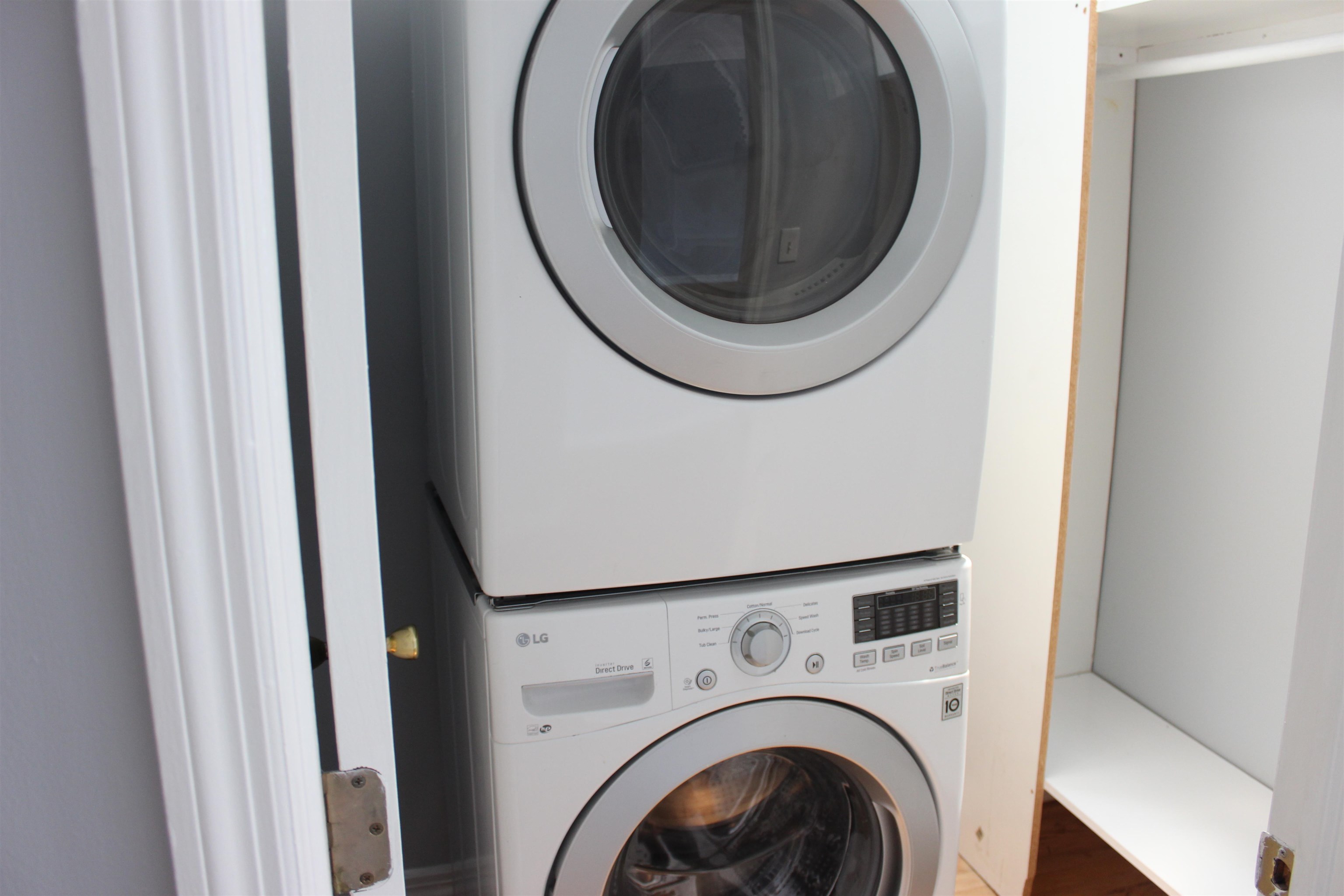 182 Christopher Columbus Drive, Unit 2 Jersey City, NJ 07302 - Photo 10 of 12 a close up view of a washer and dryer