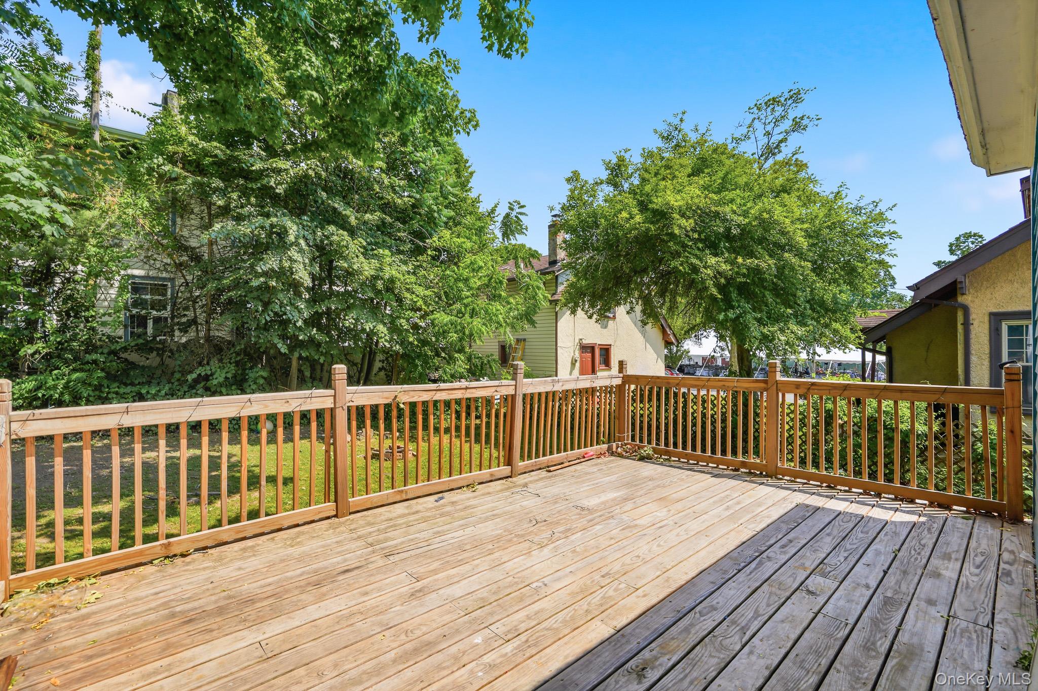 65 North Clinton Street Poughkeepsie, NY 12601 - Photo 36 of 43 a view of wooden deck and a yard