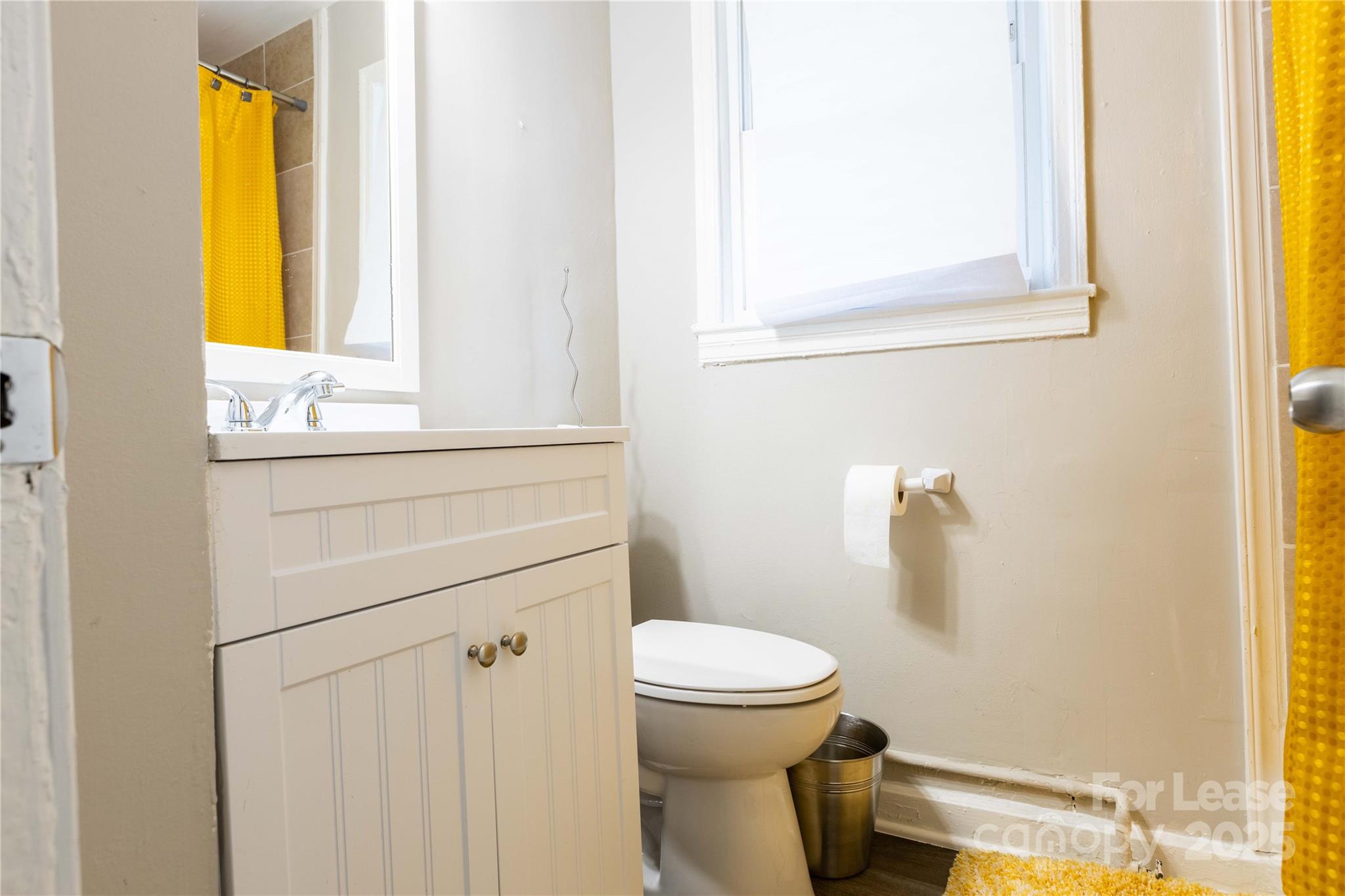 2012 Double Oaks Road Charlotte, NC 28206 - Photo 14 of 14 a bathroom with a sink and a toilet