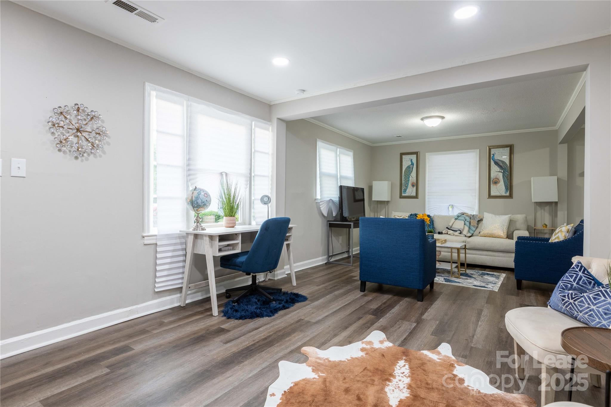 2012 Double Oaks Road Charlotte, NC 28206 - Photo 4 of 14 a living room with furniture and wooden floor