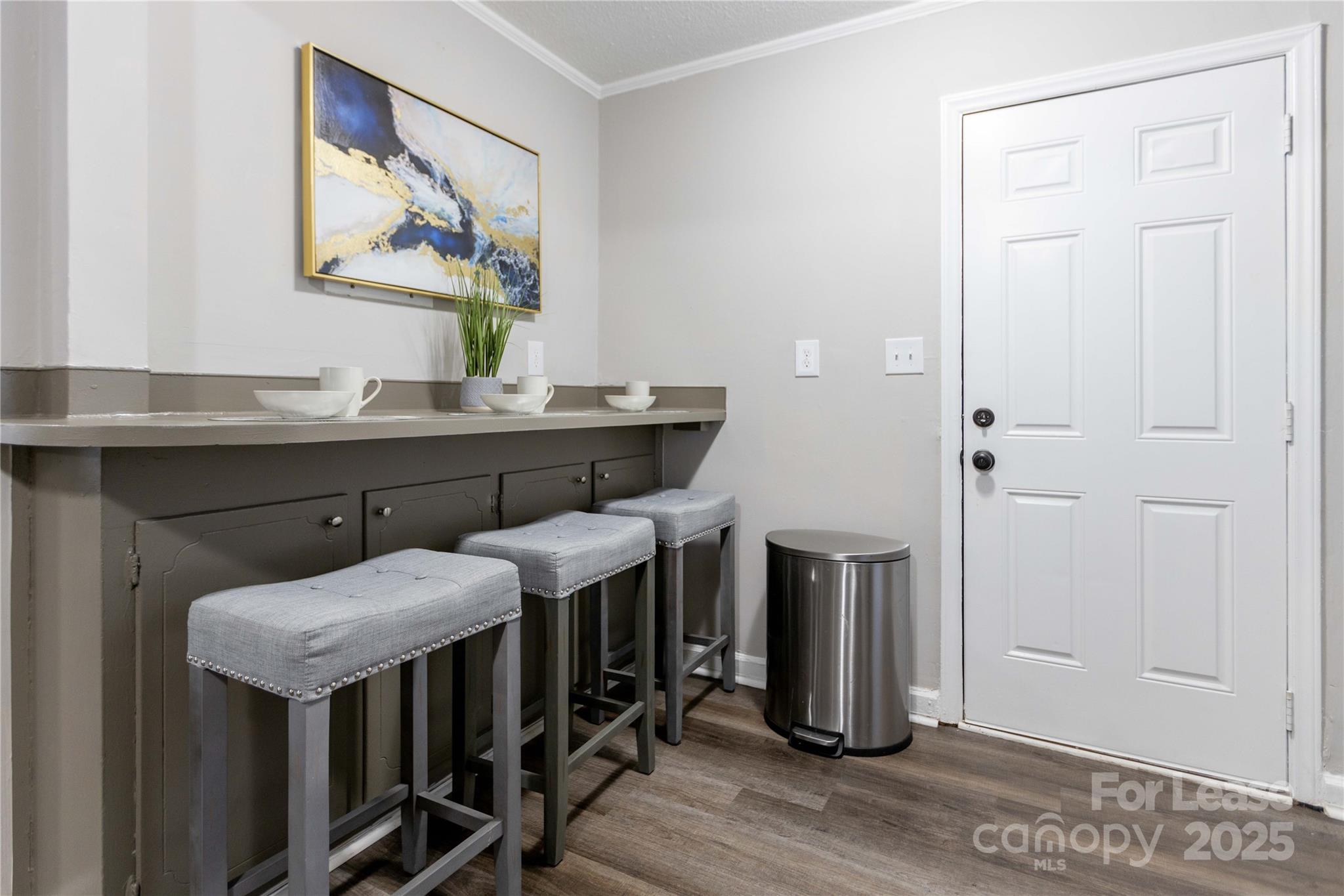 2012 Double Oaks Road Charlotte, NC 28206 - Photo 10 of 14 a room with furniture and wooden floor