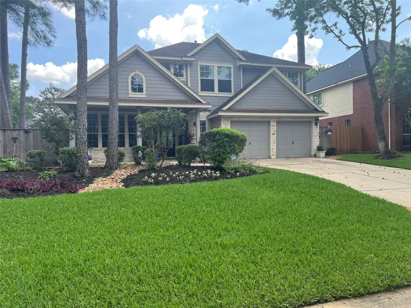 $700,000 | 26 Merit Woods Place, The Woodlands, TX 77382