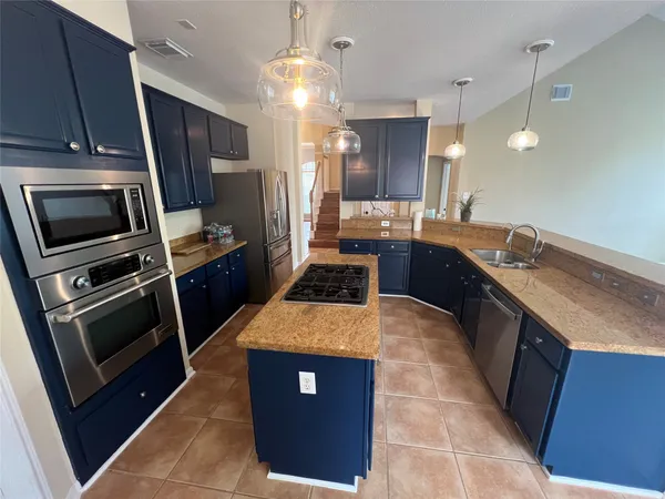 $700,000 | 26 Merit Woods Place, The Woodlands, TX 77382