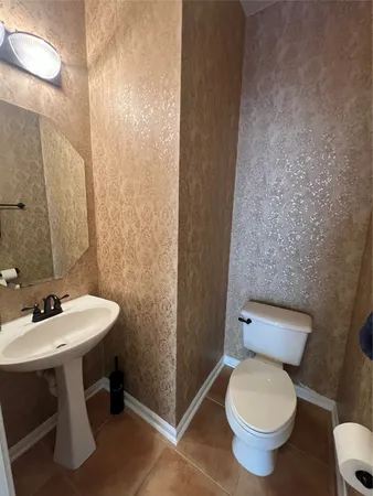 $700,000 | 26 Merit Woods Place, The Woodlands, TX 77382