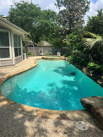 $700,000 | 26 Merit Woods Place, The Woodlands, TX 77382