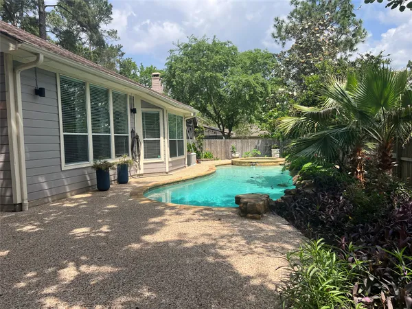 $700,000 | 26 Merit Woods Place, The Woodlands, TX 77382