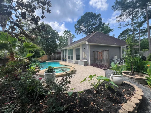 $700,000 | 26 Merit Woods Place, The Woodlands, TX 77382