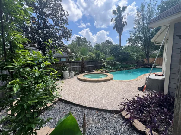 $700,000 | 26 Merit Woods Place, The Woodlands, TX 77382