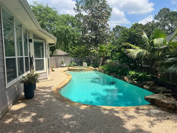 $700,000 | 26 Merit Woods Place, The Woodlands, TX 77382