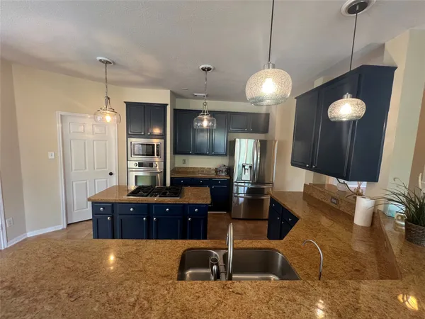 $700,000 | 26 Merit Woods Place, The Woodlands, TX 77382