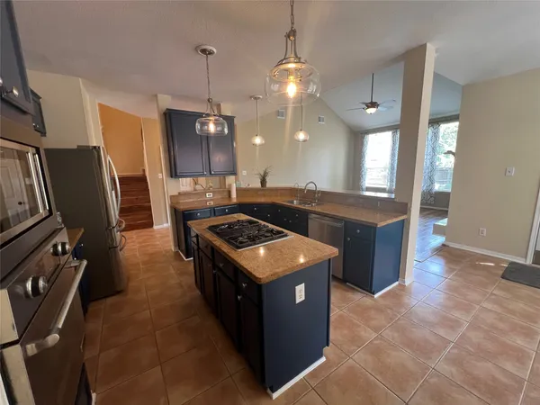 $700,000 | 26 Merit Woods Place, The Woodlands, TX 77382