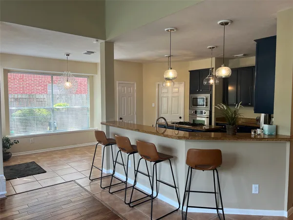 $700,000 | 26 Merit Woods Place, The Woodlands, TX 77382