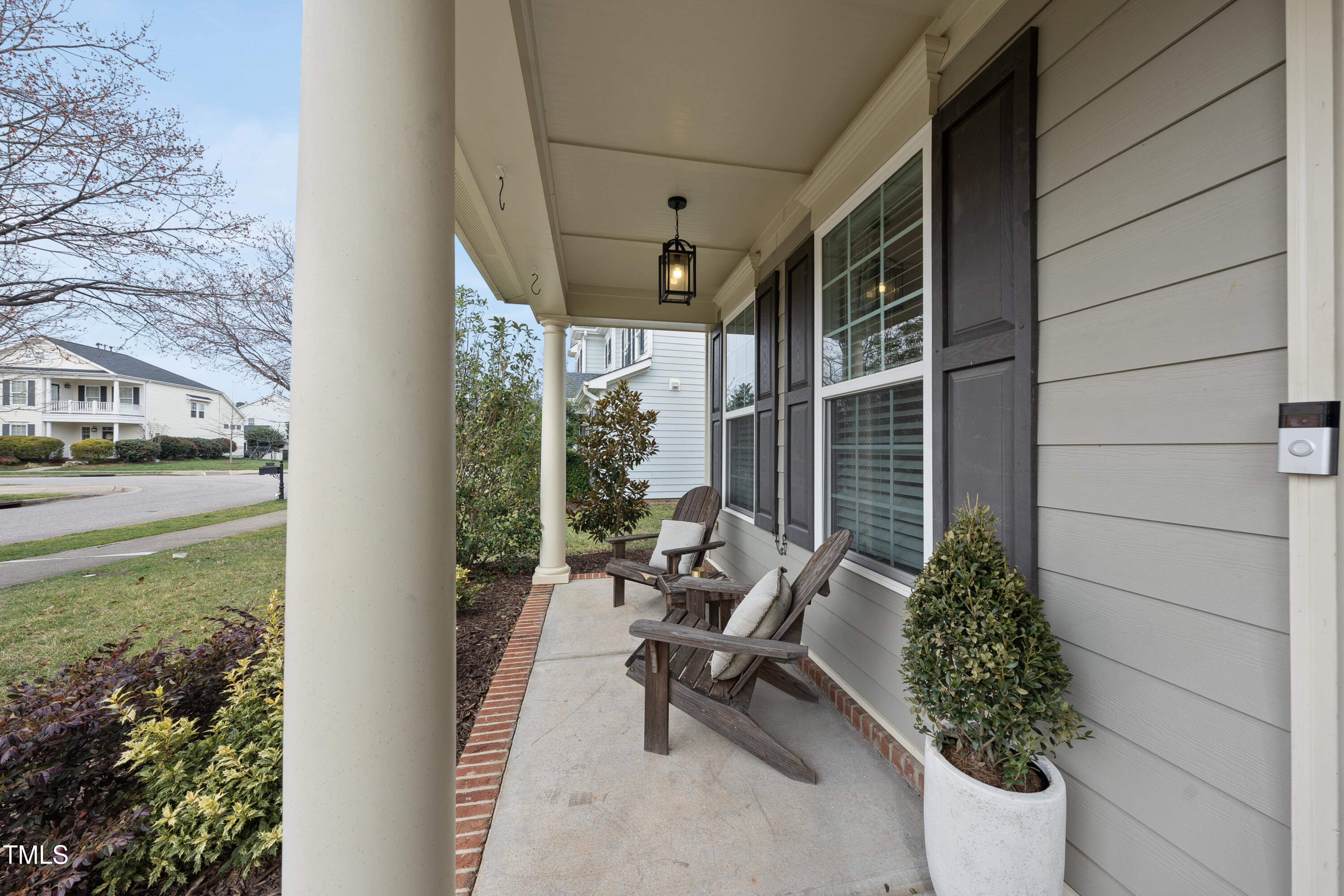 714 Chapanoke Road Raleigh, NC 27603 - Photo 39 of 45 a view of a porch with chairs and a yard
