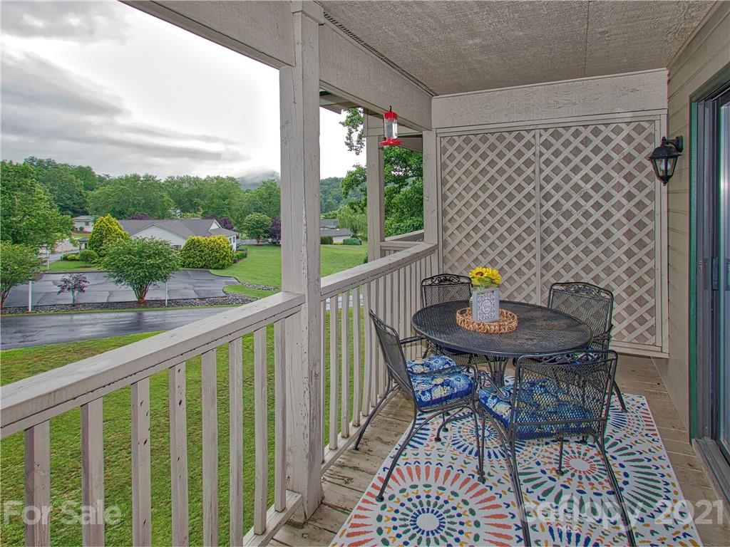 160 Whitney Boulevard, Unit 65 Lake Lure, NC 28746 - Photo 11 of 21 a view of a outdoor seating area