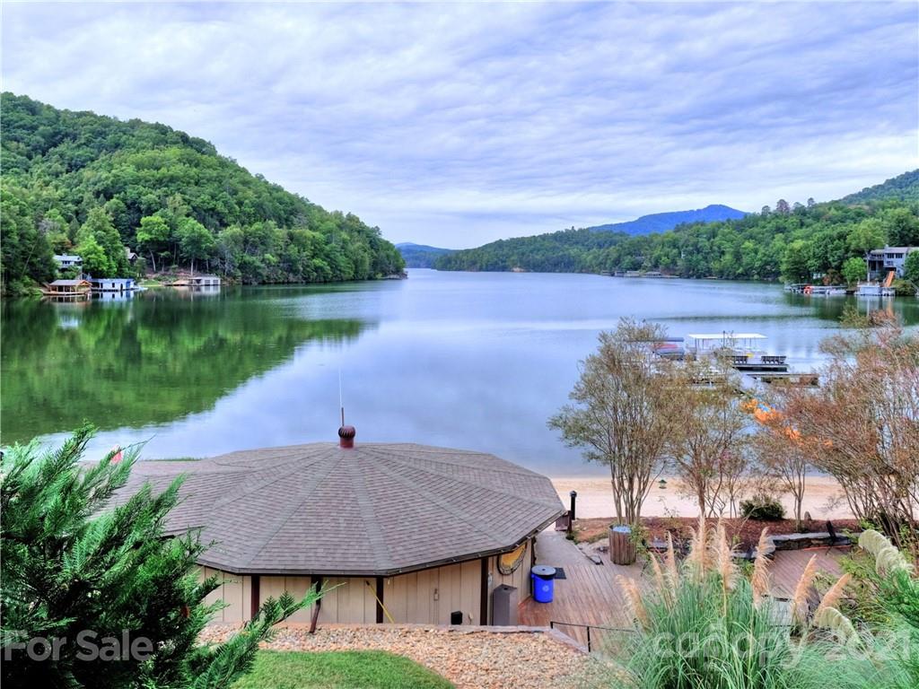 160 Whitney Boulevard, Unit 65 Lake Lure, NC 28746 - Photo 17 of 21 a lake view with a lake view