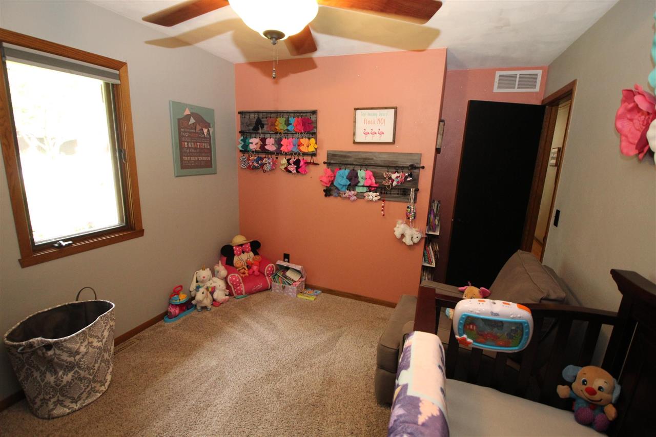 3684 Valerie Road Roscoe, IL 61073 - Photo 15 of 26 a bedroom with a bed and a window