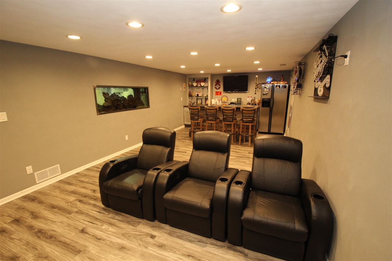 3684 Valerie Road Roscoe, IL 61073 - Photo 19 of 26 a living room with furniture and a wooden floor