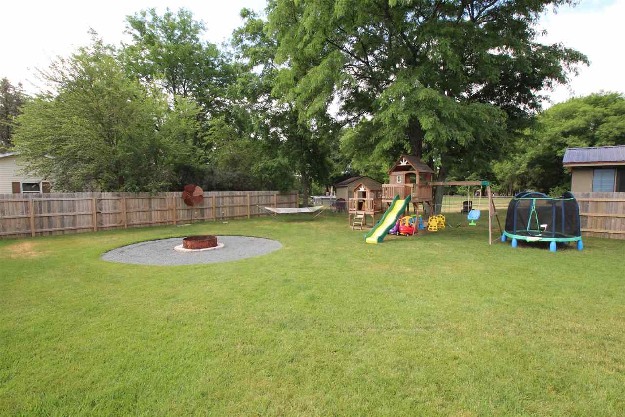 3684 Valerie Road Roscoe, IL 61073 - Photo 22 of 26 a view of a swimming pool with a slide