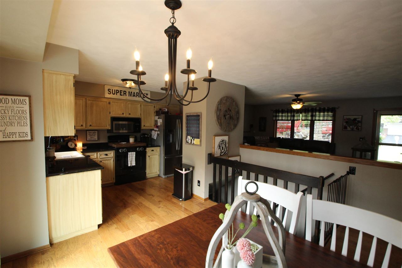 3684 Valerie Road Roscoe, IL 61073 - Photo 4 of 26 a view of a kitchen and dining room