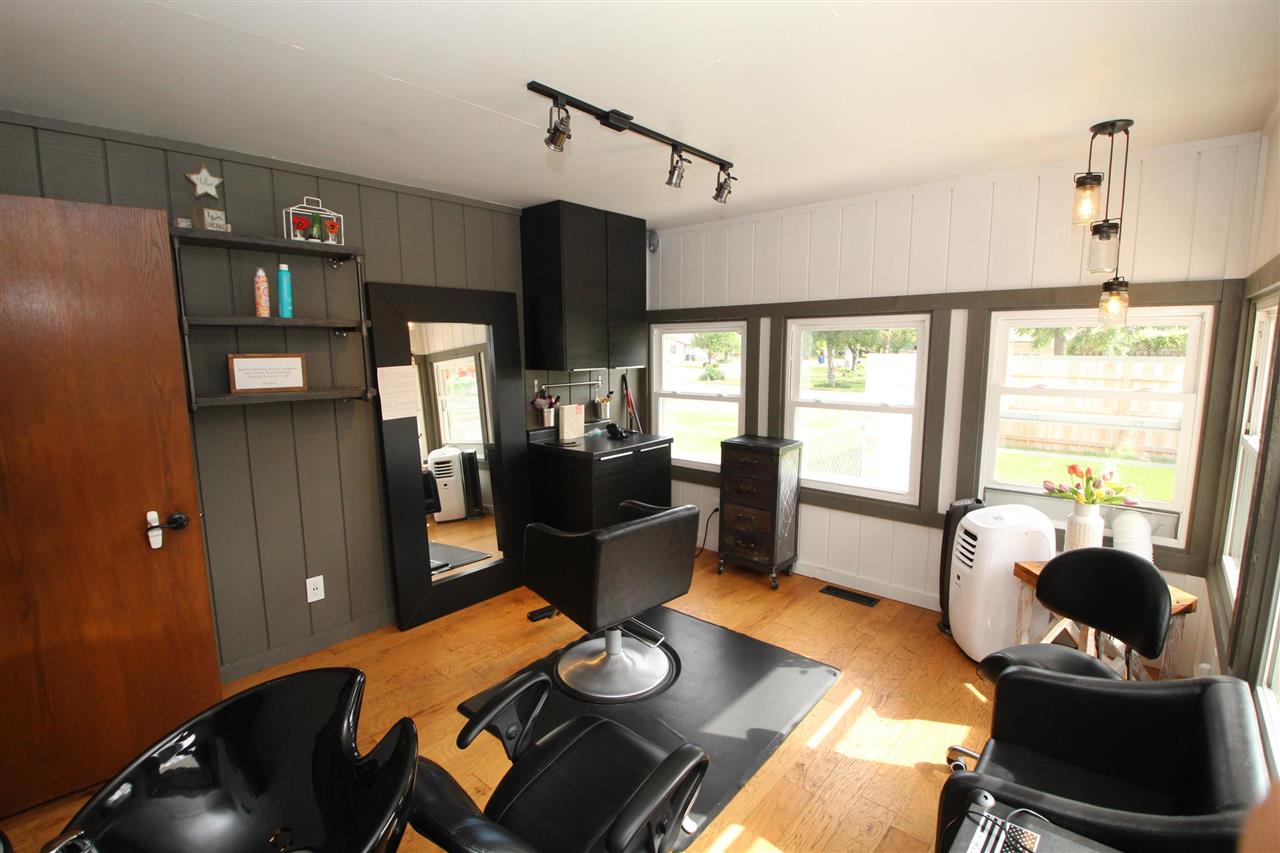 3684 Valerie Road Roscoe, IL 61073 - Photo 8 of 26 a view of a workspace with furniture and a window