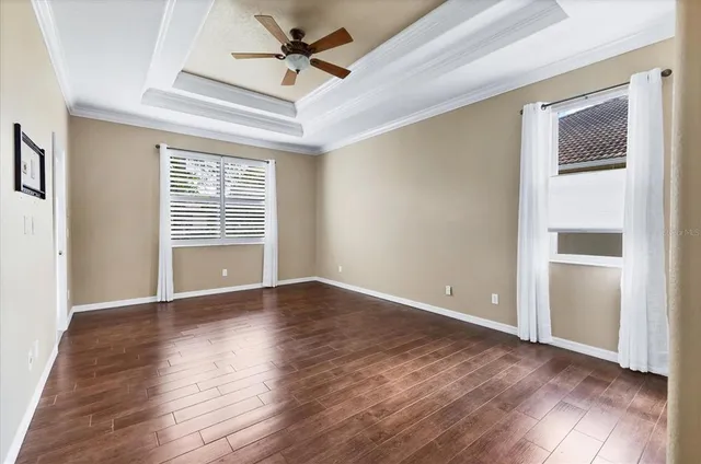 a large bathroom with a double vanity sink mirror and a bathtub