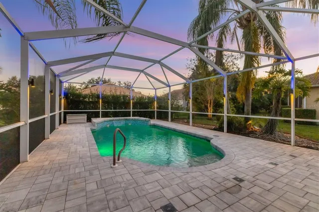 a garden with trees in front of it