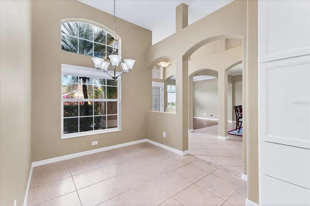 a view of a hallway with seating area