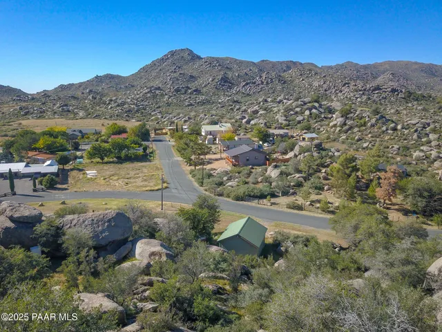 a view of a mountain with a outdoor space