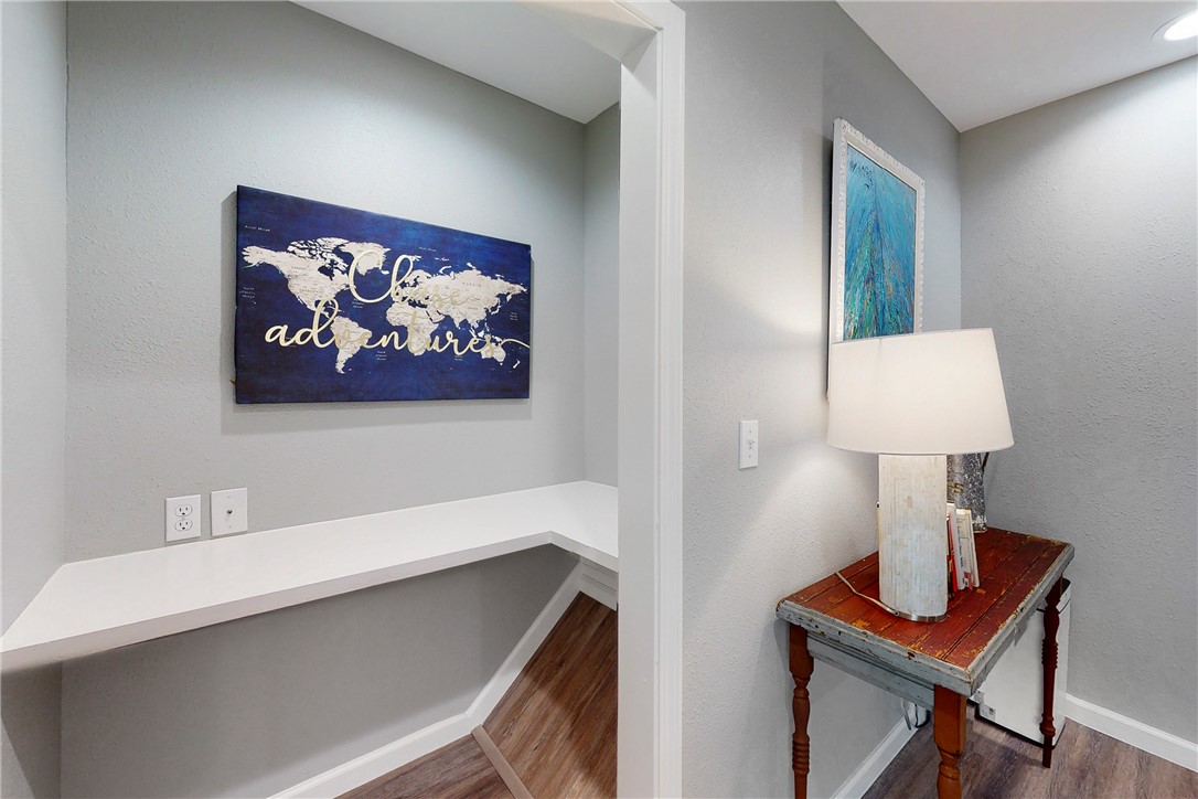 513 Boyett Street, Unit 2 College Station, TX 77840 - Photo 12 of 22 a view of a workspace room with furniture and a lamp