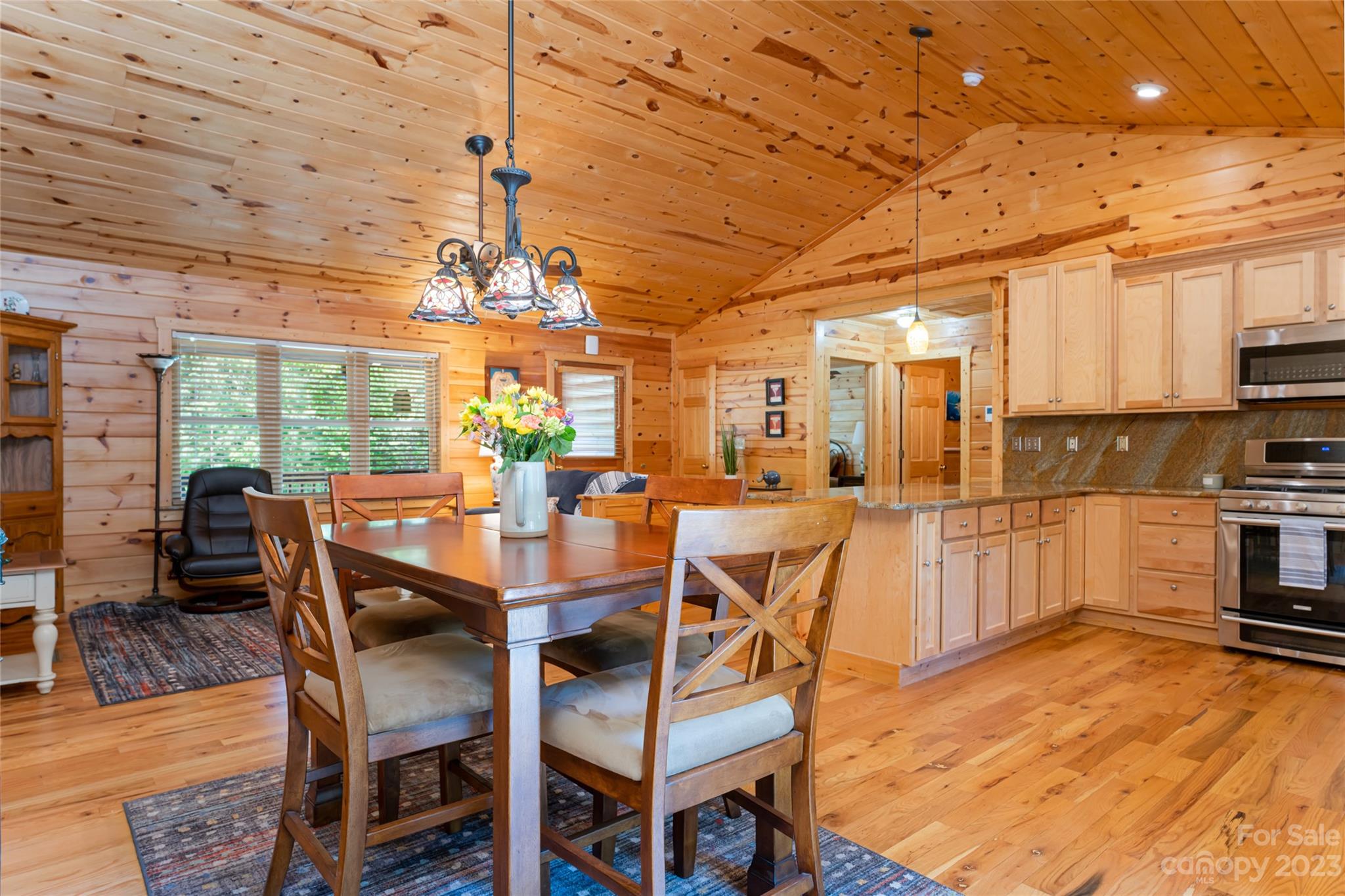 134 Quebec Trail Bostic, NC 28018 - Photo 14 of 37 a view of a dining room with furniture window and outside view