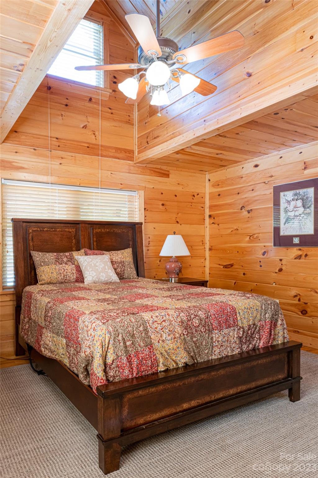 134 Quebec Trail Bostic, NC 28018 - Photo 19 of 37 a bedroom with a bed and a night stand