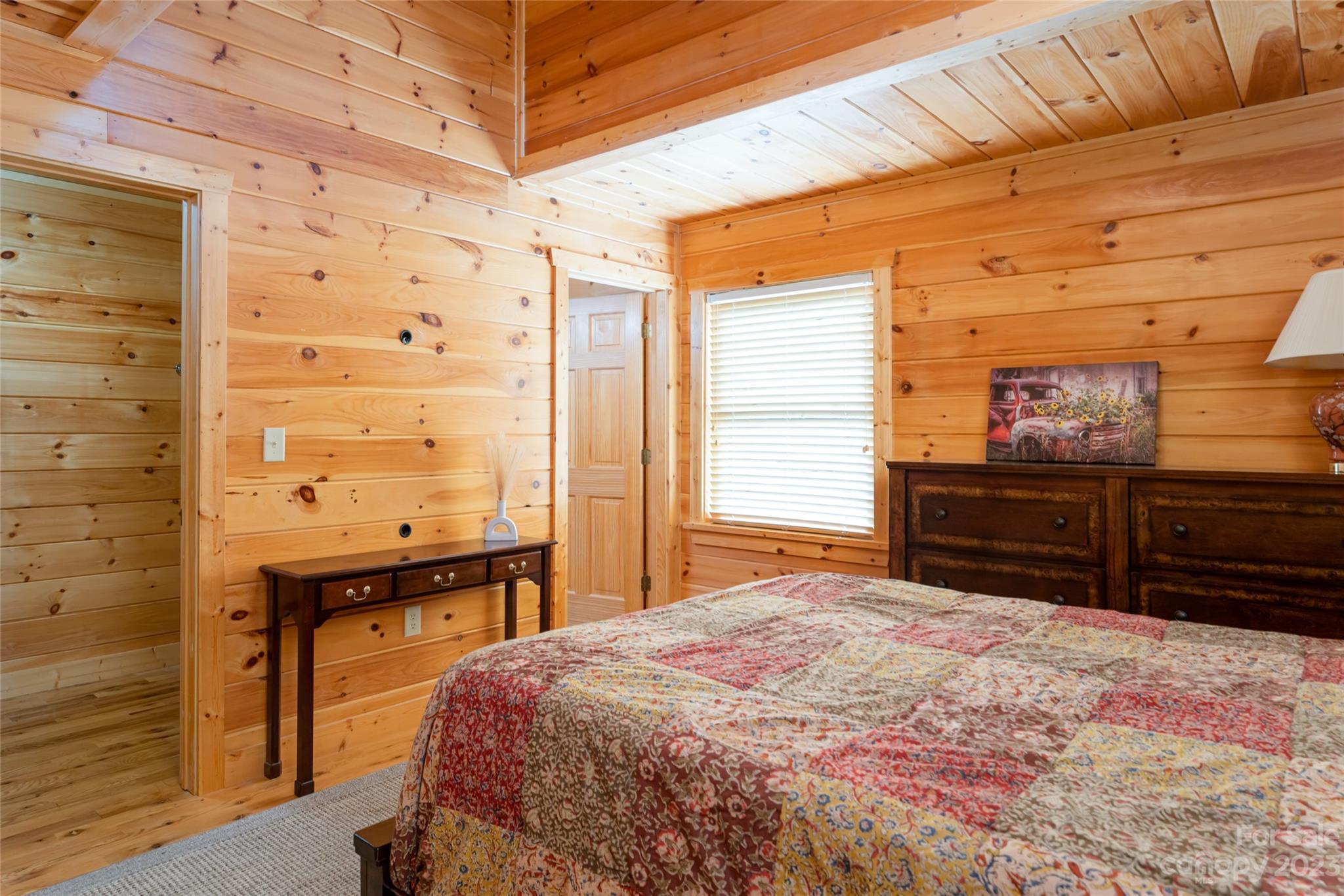 134 Quebec Trail Bostic, NC 28018 - Photo 21 of 37 a bedroom with a bed and a dresser