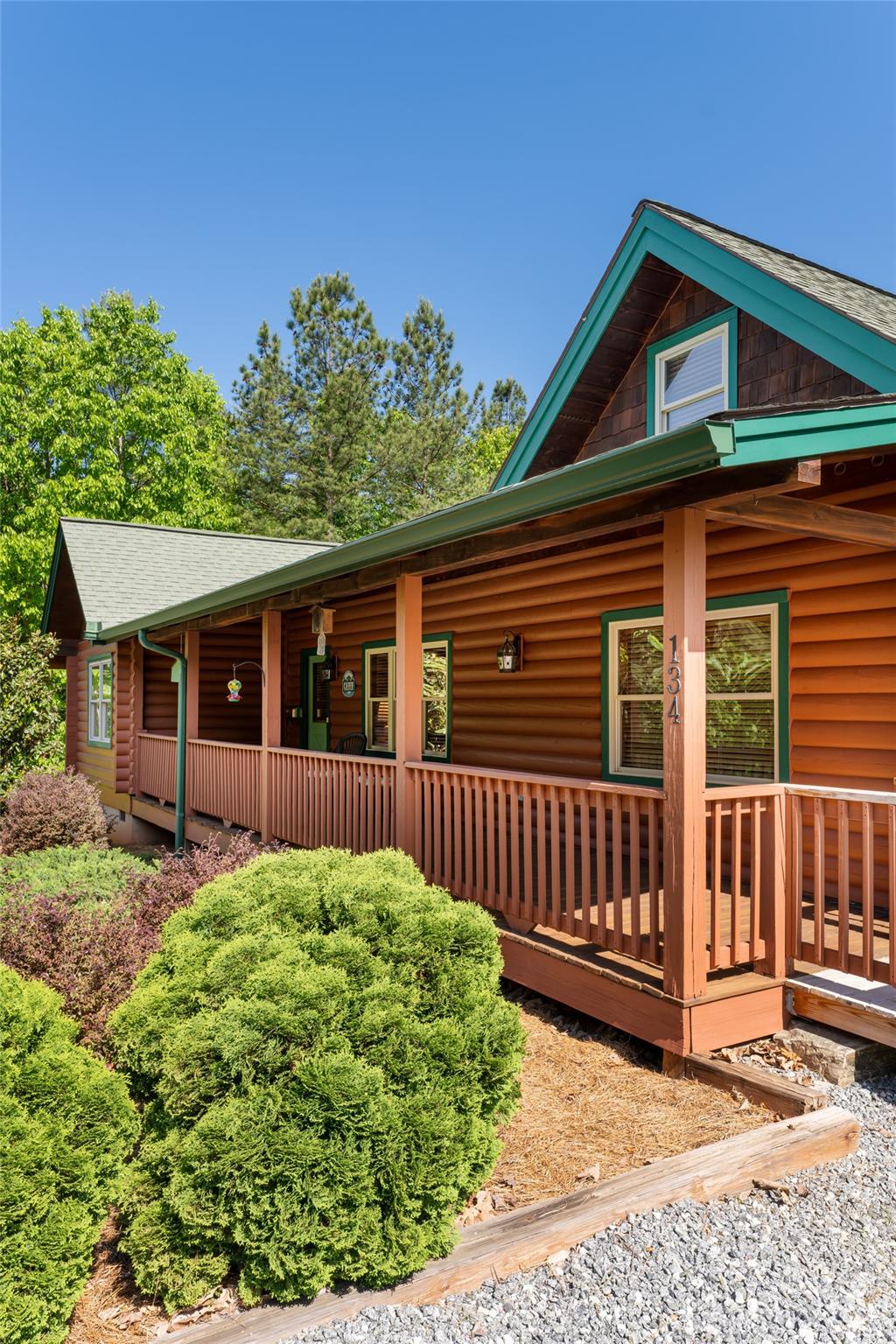 134 Quebec Trail Bostic, NC 28018 - Photo 29 of 37 a front view of a house with garden