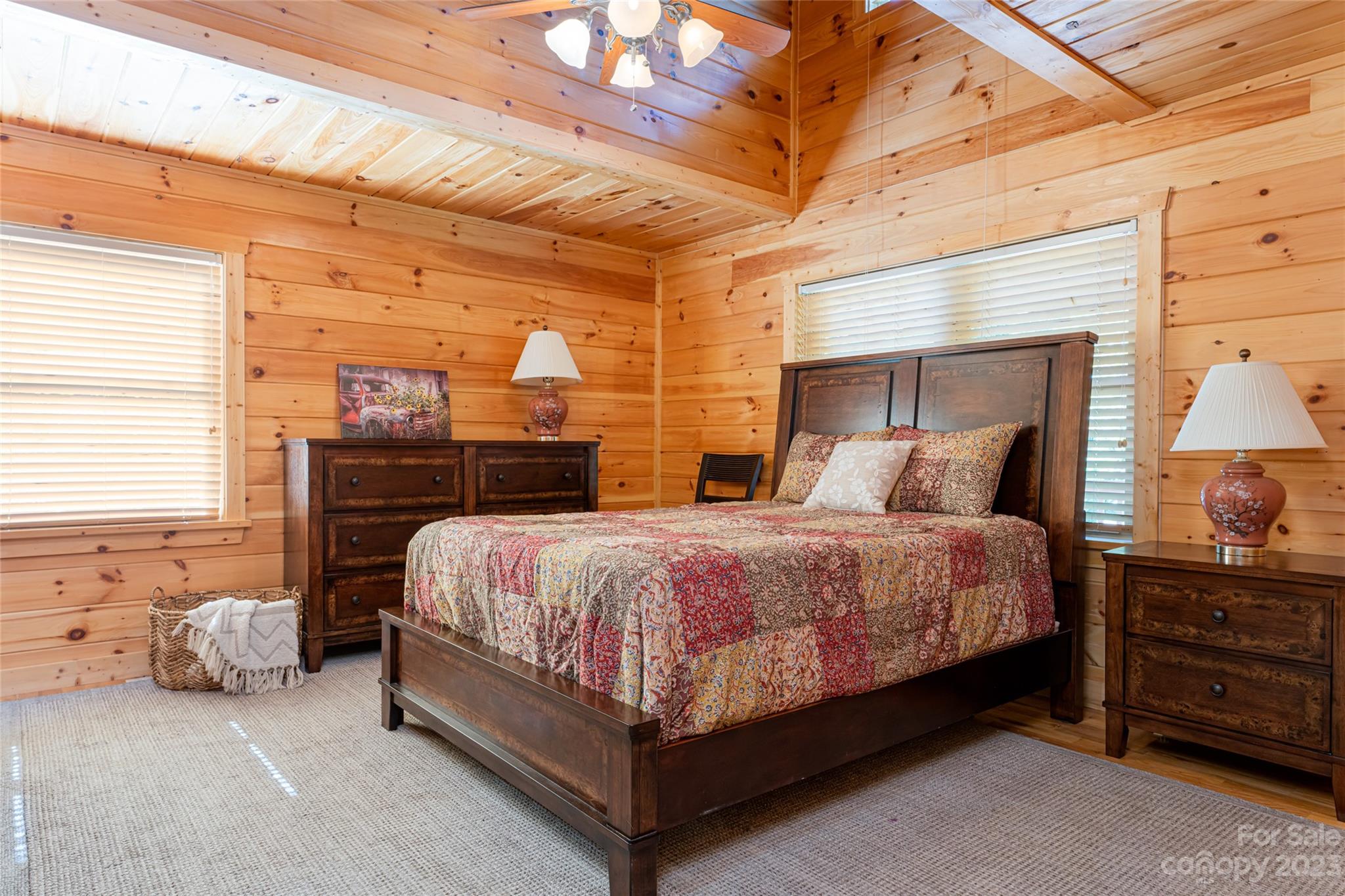 134 Quebec Trail Bostic, NC 28018 - Photo 3 of 37 a large bed sitting in a room next to a lamp